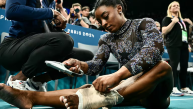 Simone Biles shakes off a calf injury to dominate during Olympic gymnastics qualifying