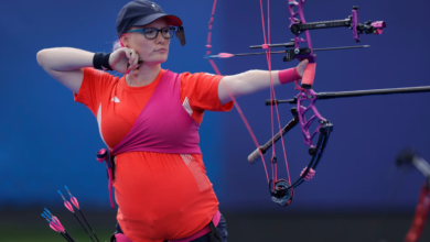 Jodie Grinham shoots into history with Paralympics archery bronze while pregnant